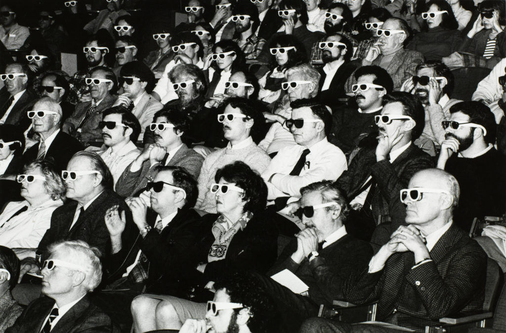 movie theater audience with 3d glasses